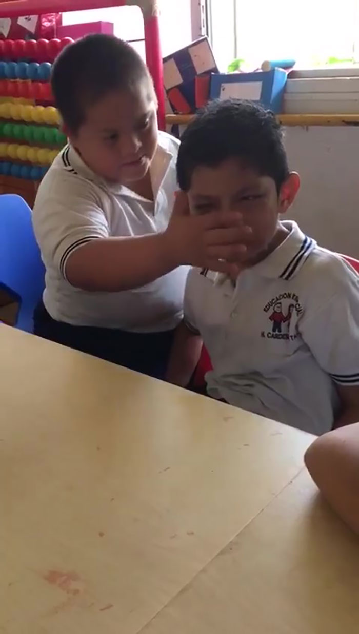 boy down syndrome crying classmate autism video 2 5de9444b102e6 700